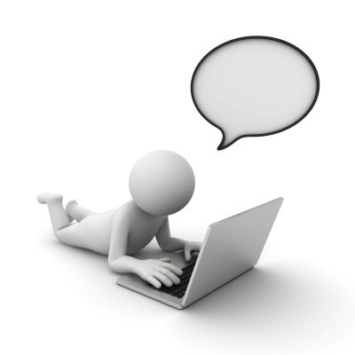 figurine at computer with blank comment cloud